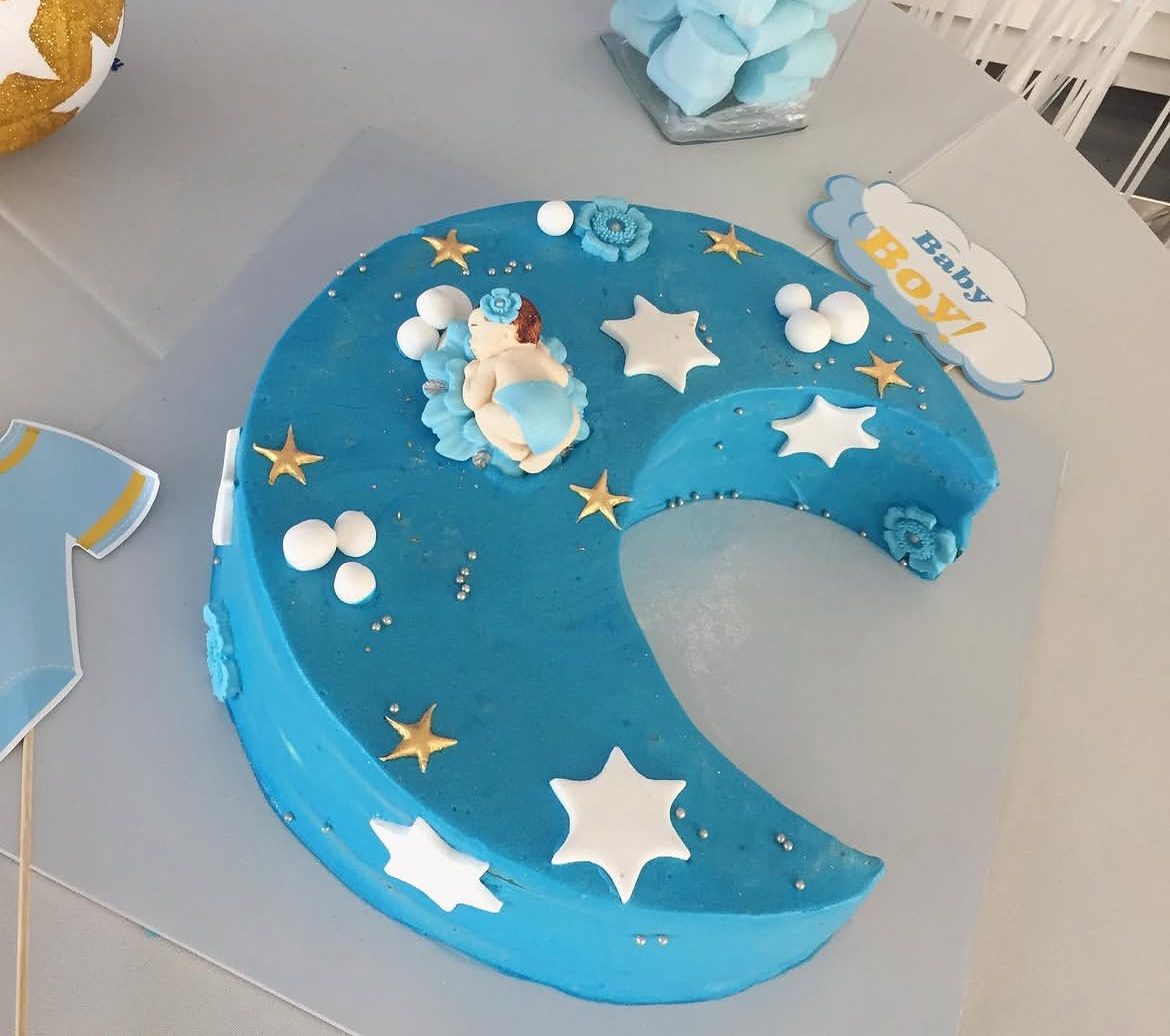 Blue moon and stars themed baby cake