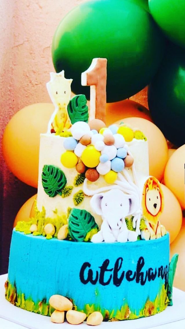 Bright green and blue first birthday cake for Allebum