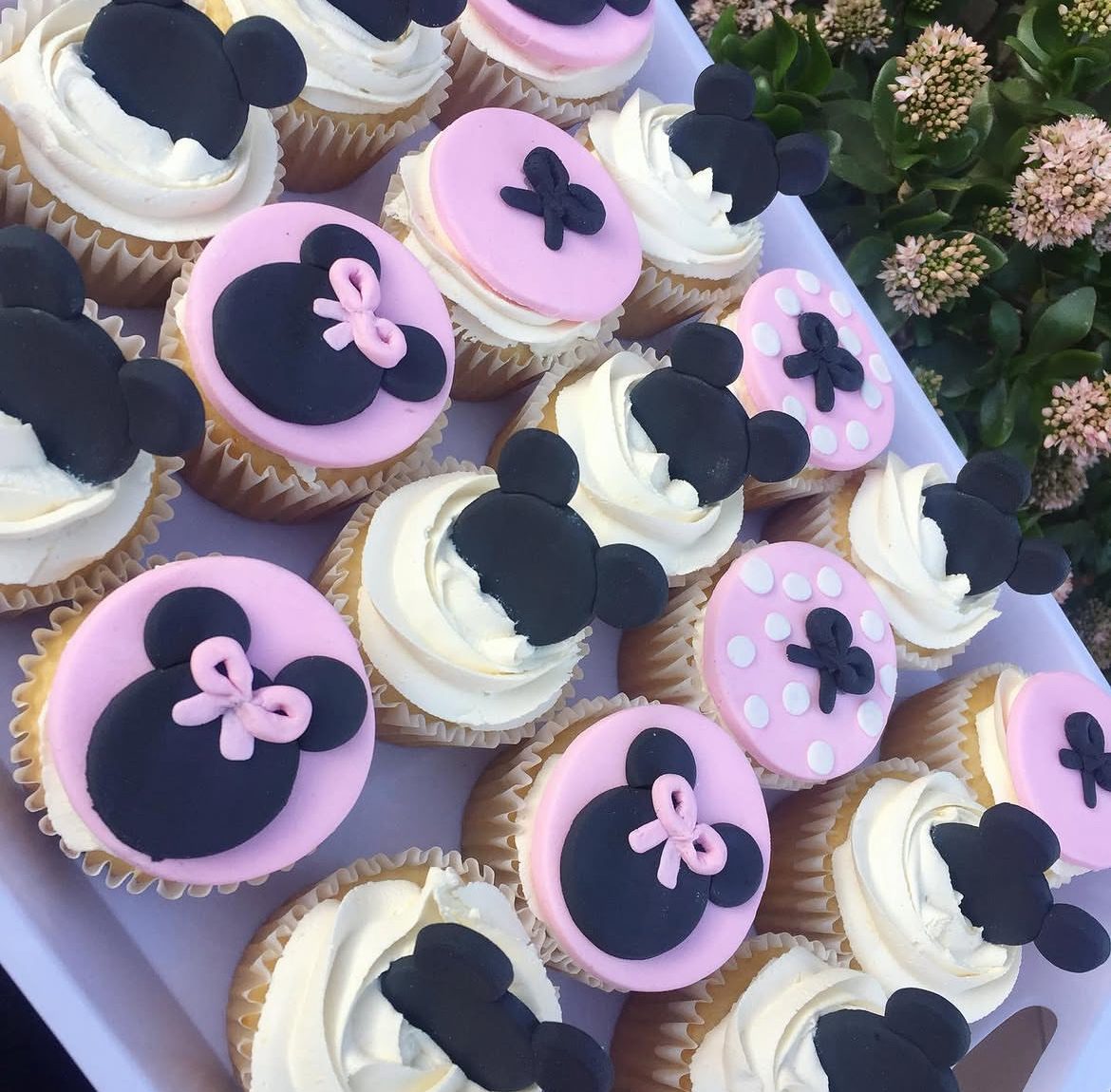 Pastel butterfly-topped cupcakes for a baby shower