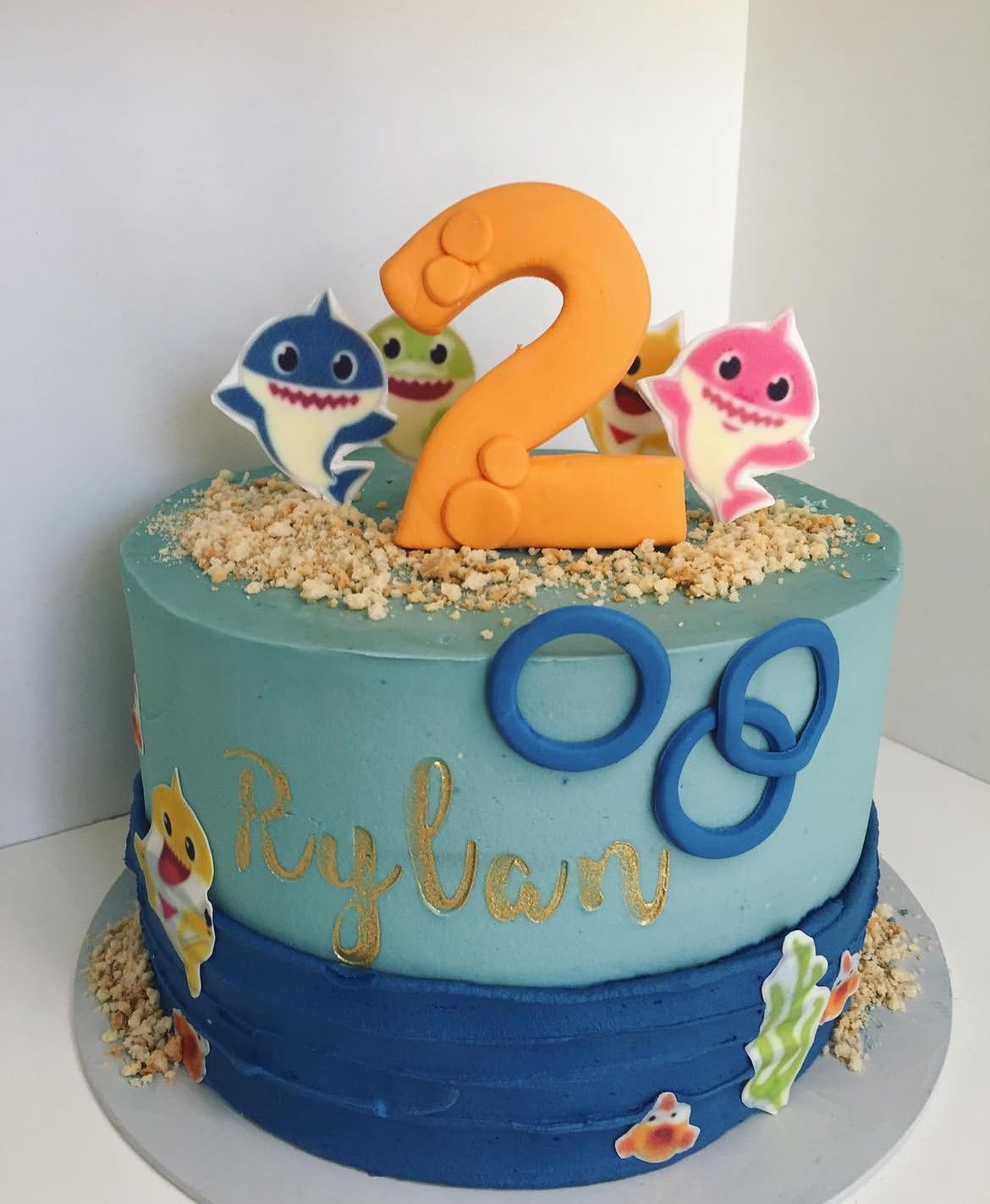 Baby Shark second birthday cake in ocean blue