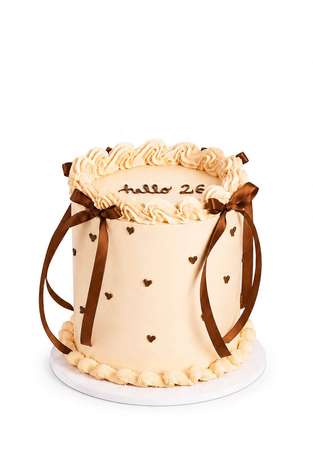 White wave-textured cake with gold happy birthday topper