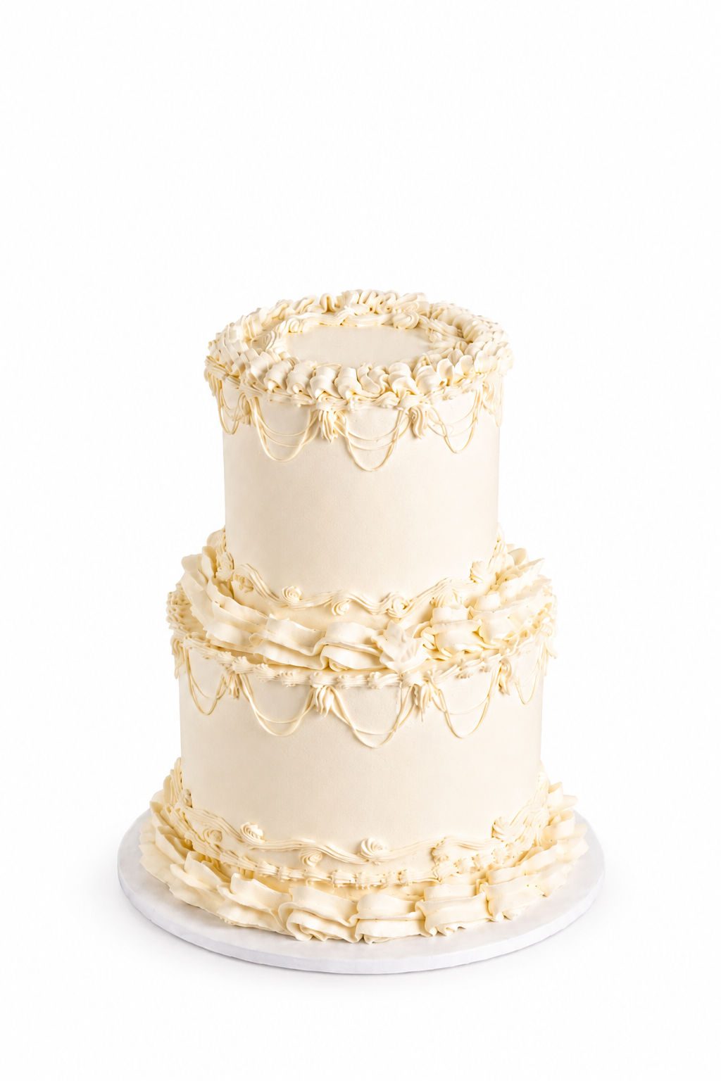 Tall nude buttercream cake with sculpted piping