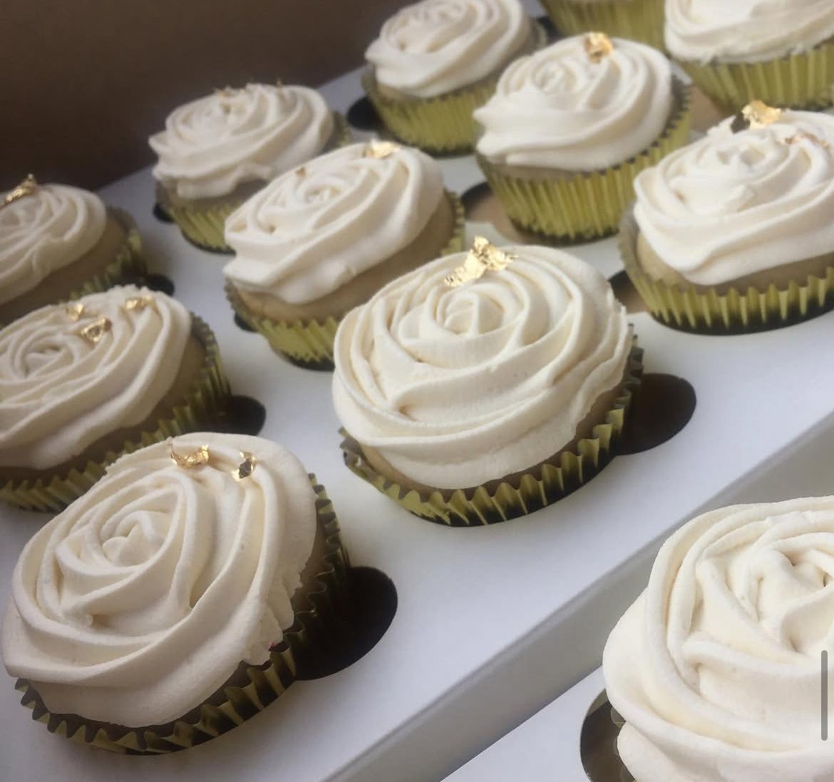White buttercream cupcakes styled for a wedding