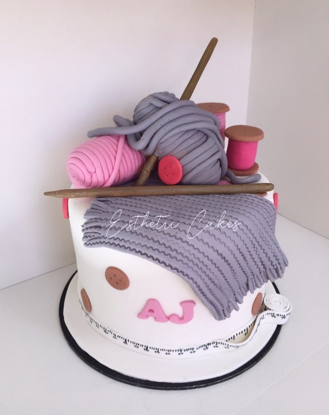 Grey and pink knitted-look celebration cake